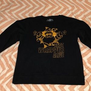 A Black And Gold Sweater.